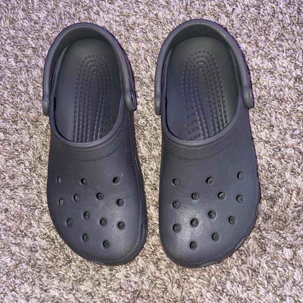 Woman’s grey crocs size 7